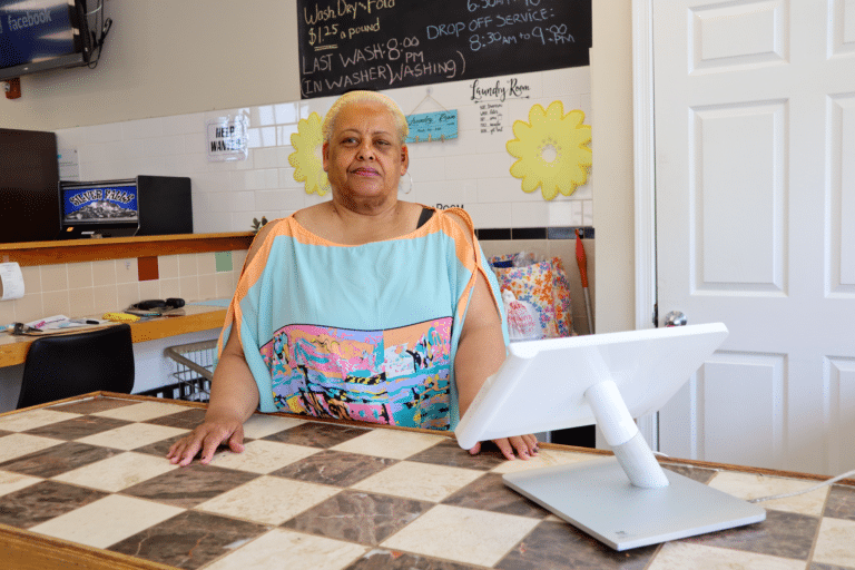 a woman sitting at a counter